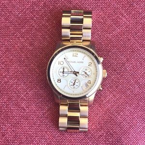 Gold MK watch